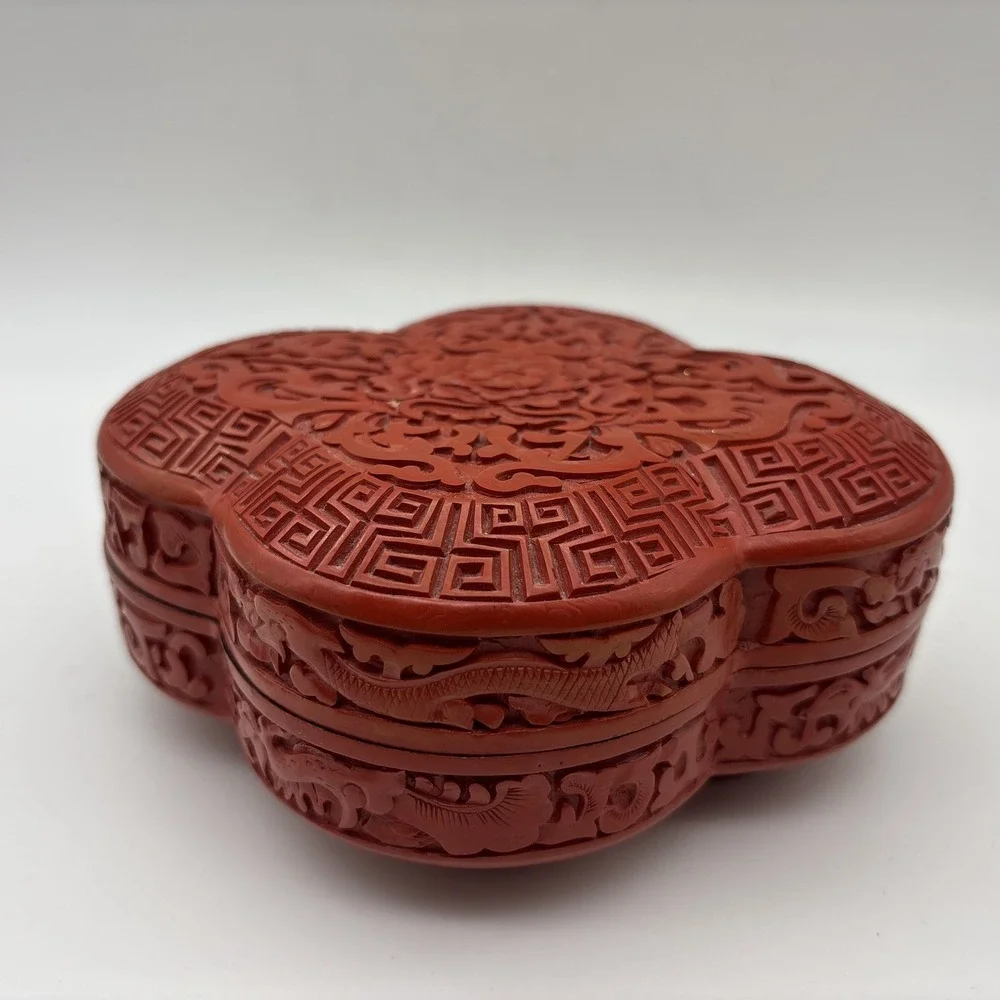 Red Cinnabar style detailed clover shaped decorative box black inside